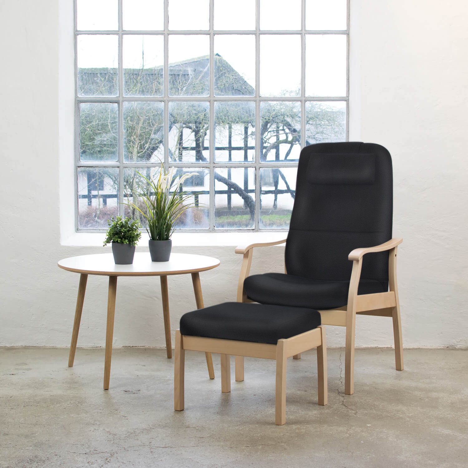 Farstrup Applaus lænestol i læder med fodskammel, sætpris